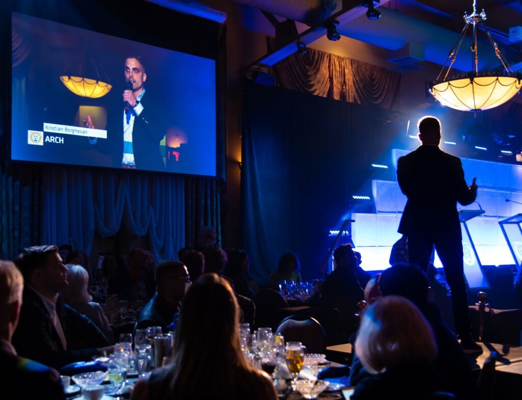 Kristian Borghesan of Arch pitching during the LiONS LAIR Pitch Competition and Gala
