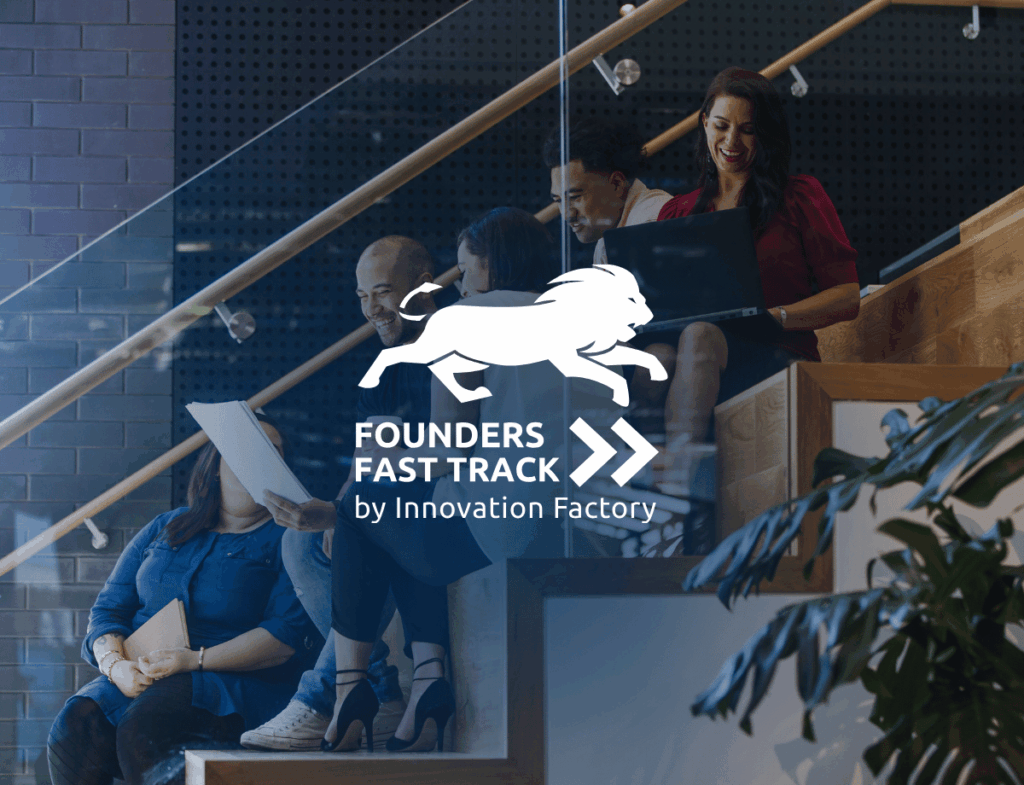 Founders Fast Track logo overlay on photo. Photo is of 5 individuals sitting on a staircase smiling and looking at a document
